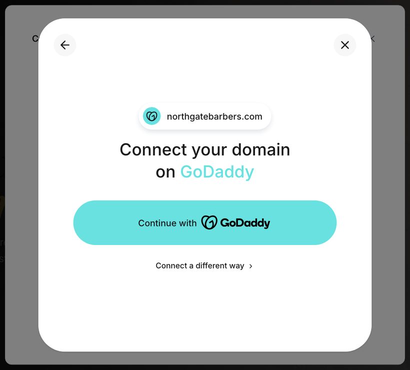The Connect your domain on GoDaddy screen with Continue with GoDaddy and Connect a different way